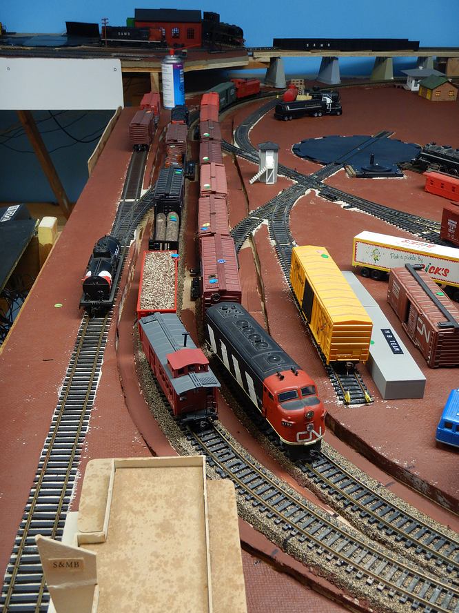 Dots on the cars tell where they are to go